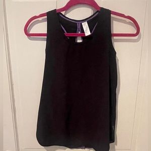 Ivivva girls size 12 black loose fitting tank w details. Lululemon girl brand.